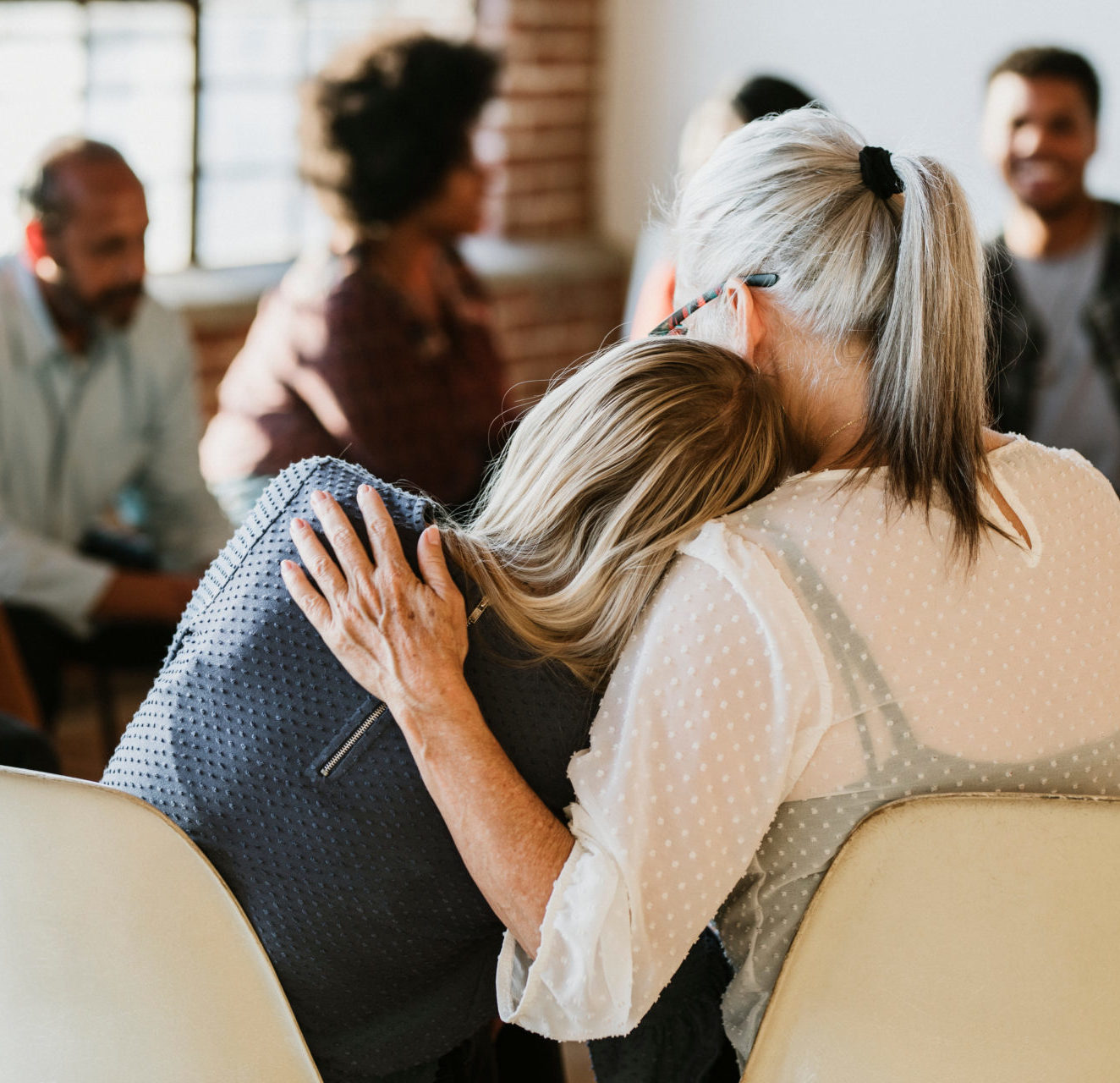 People support each other in a rehab session